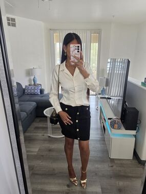 Hermit in buttoned cream satin